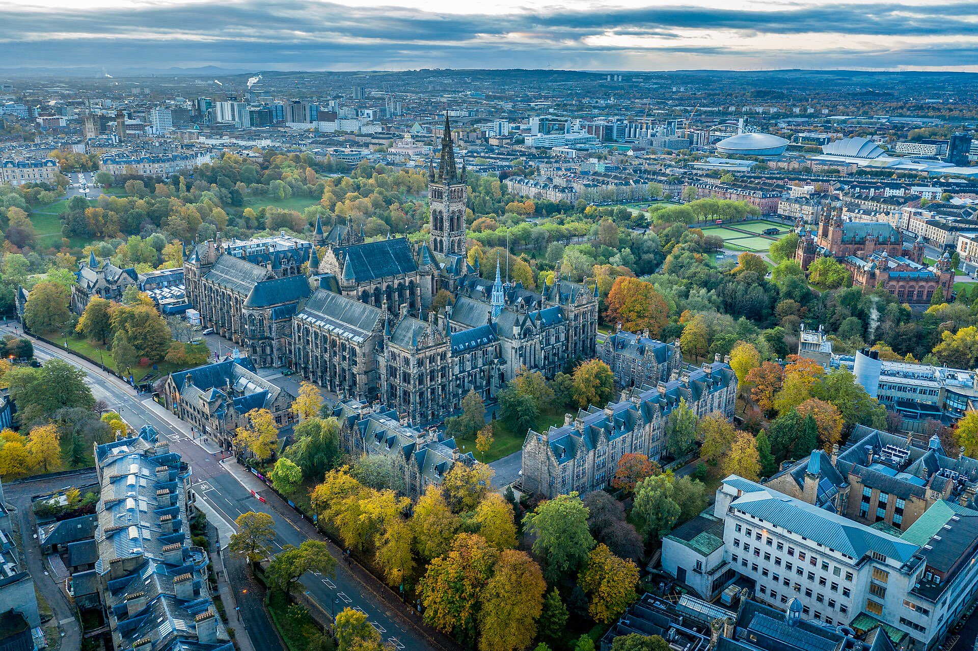 Autumn view over Glasgow, with the University of Glasgow tower rising above golden trees